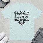 Light heather t-shirt with "Pickleball Makes Me Say Bad Words" and crossed paddles with a pickleball.