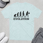 T-shirt with "EVOLUTION" text and silhouettes depicting human evolution to pickleball player.