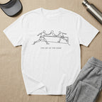 White t-shirt with minimalist line art of pickleball players and the text "THE ART OF THE GAME".
