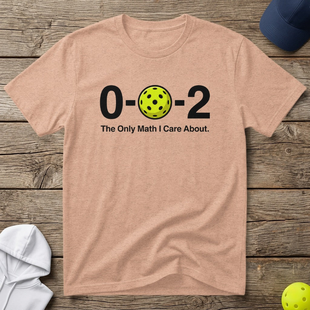 Peach t-shirt with pickleball graphic and "0-2 The Only Math I Care About."