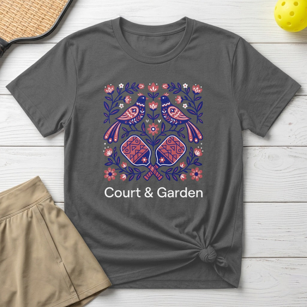 Dark grey t-shirt with birds and pickleball paddles graphic.