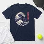 Navy t-shirt with a stylized wave and pickleball paddle graphic.
