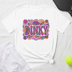 White t-shirt with "DINKY" in colorful, psychedelic lettering and playful floral accents.