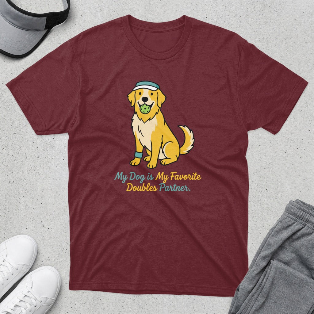 Golden retriever in hat and wristband holding tennis ball, text: My Dog is My Favorite Doubles Partner.