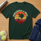 Dark green t-shirt with "Pickleball & Chill" text and pickleball paddle graphic.
