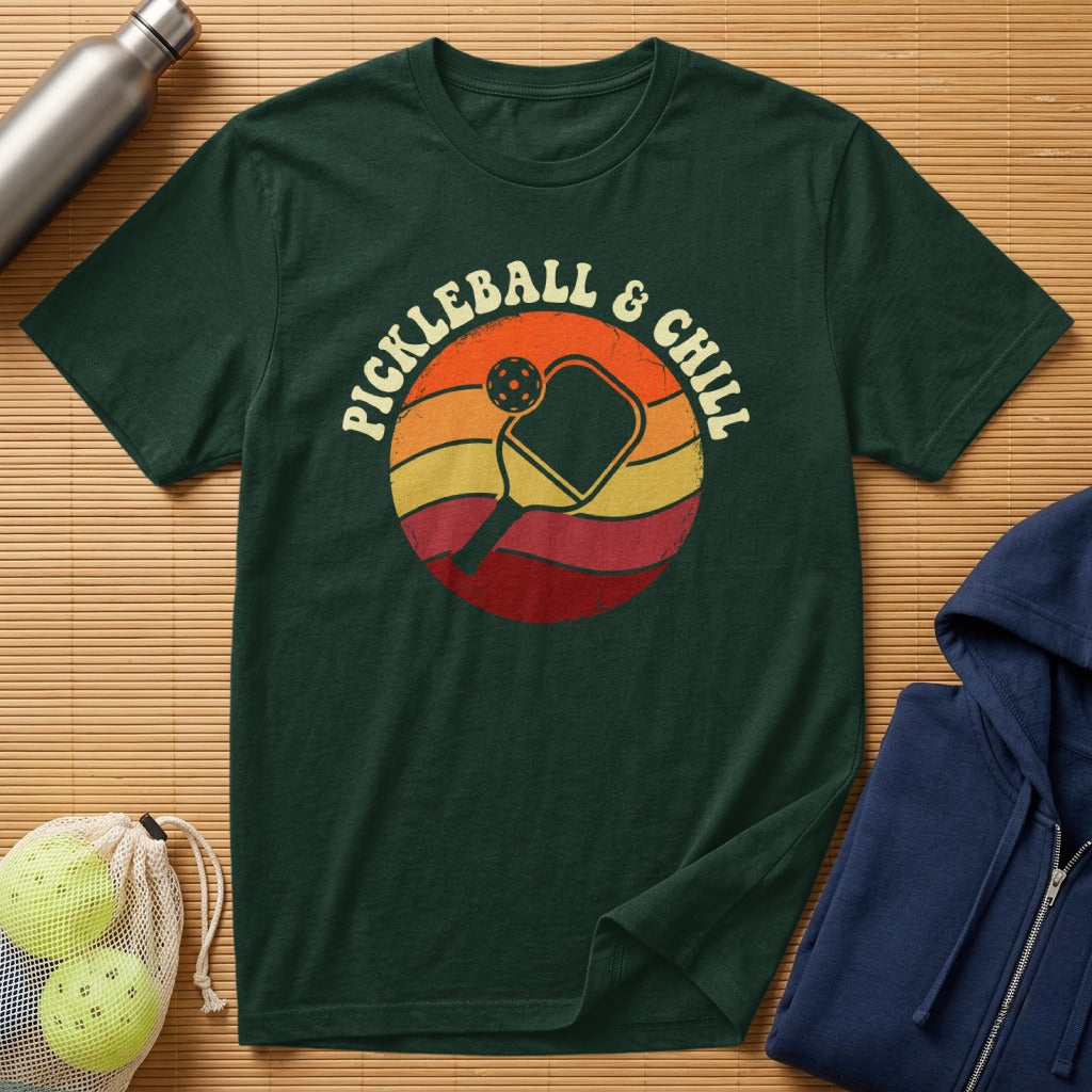 Dark green t-shirt with "Pickleball & Chill" text and pickleball paddle graphic.