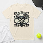 "Kitchen Reaper" skull logo with crossed pickleball paddles on a cream t-shirt.
