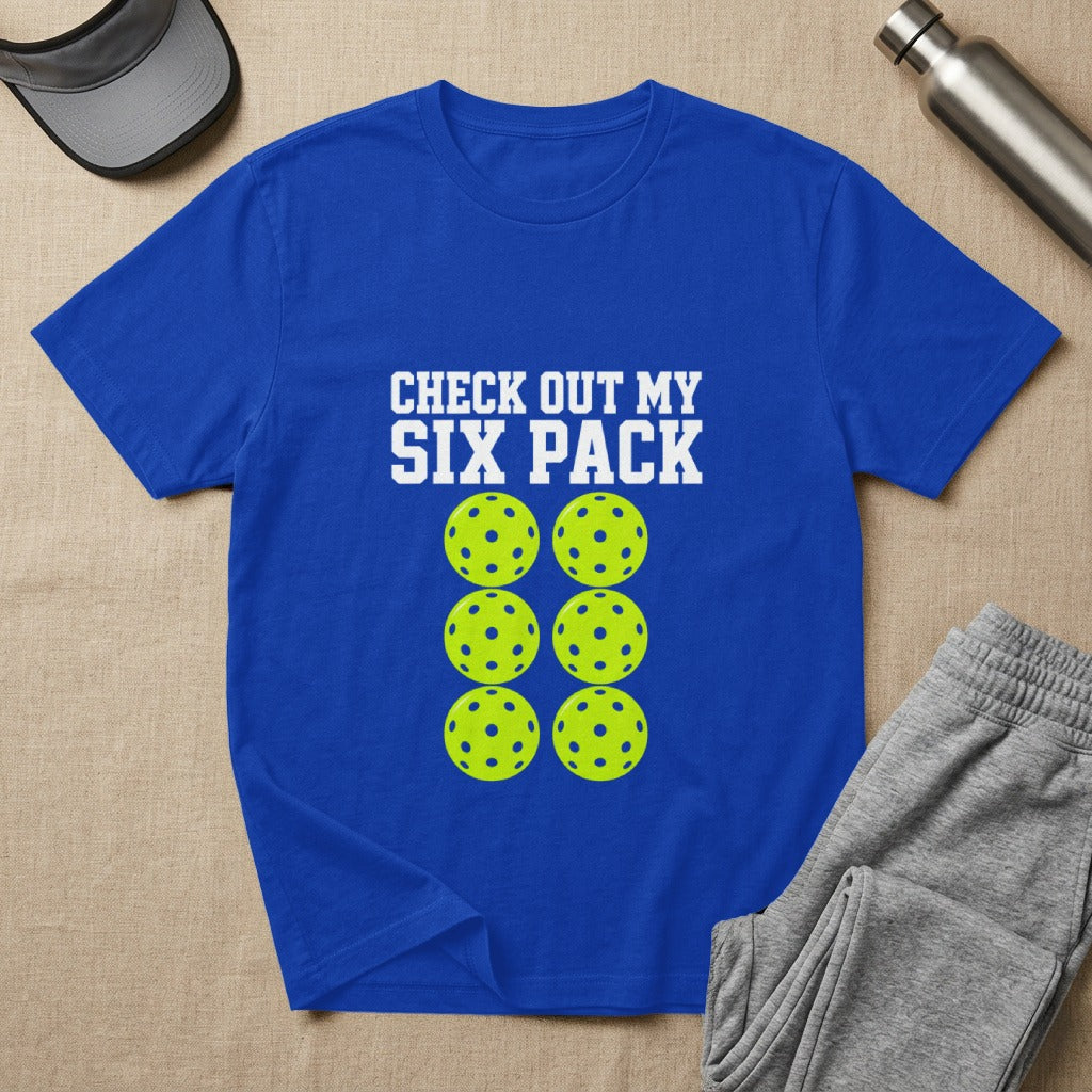 Blue t-shirt with yellow pickleballs and "CHECK OUT MY SIX PACK" text.