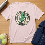 T-shirt with cartoon pickle holding a tennis racket, saying "Stay Out of the Kitchen!".