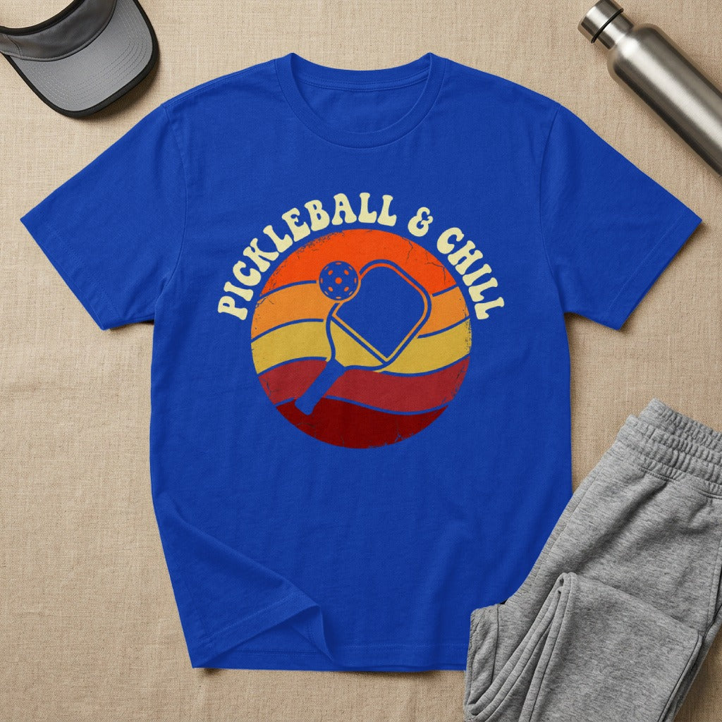 Blue t-shirt with "Pickleball & Chill" retro sunset graphic.