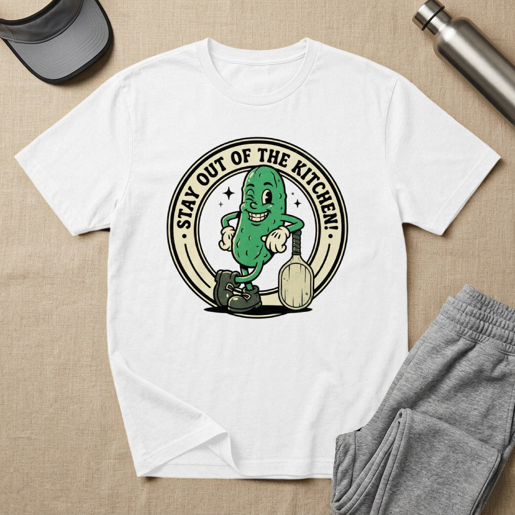 Cartoon pickle with a pickleball paddle, "STAY OUT OF THE KITCHEN!" text.