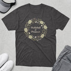 Dark gray t-shirt with a wreath of pickleball paddles, flowers, and text "Pickleball & Prosecco".