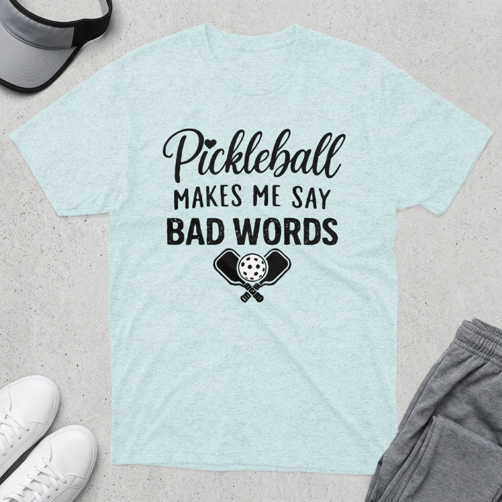 Light blue t-shirt with "Pickleball Makes Me Say Bad Words" and crossed paddles.