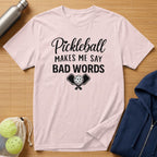 Pink t-shirt with "Pickleball Makes Me Say BAD WORDS" and crossed paddles/ball graphic.