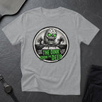 T-shirt with circular graphic of a green-eyed monster rising from water, "The Dink From The Deep" text.