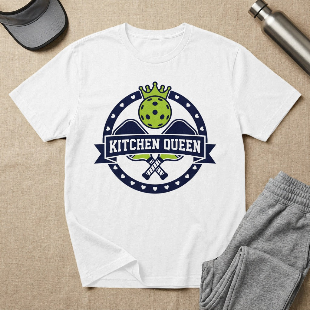 White t-shirt with "Kitchen Queen" text and pickleball paddles and ball graphic.
