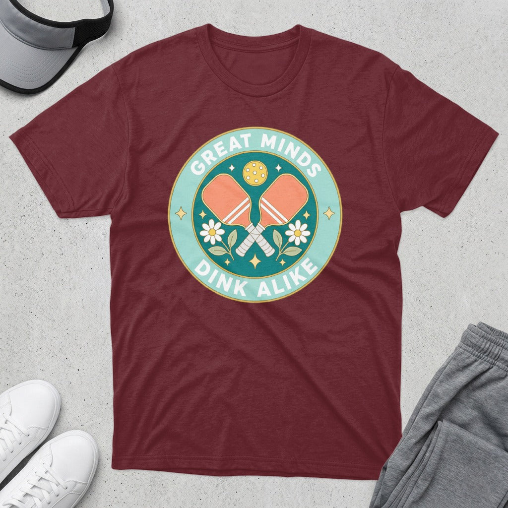 Maroon t-shirt with "Great Minds Dink Alike" pickleball graphic.