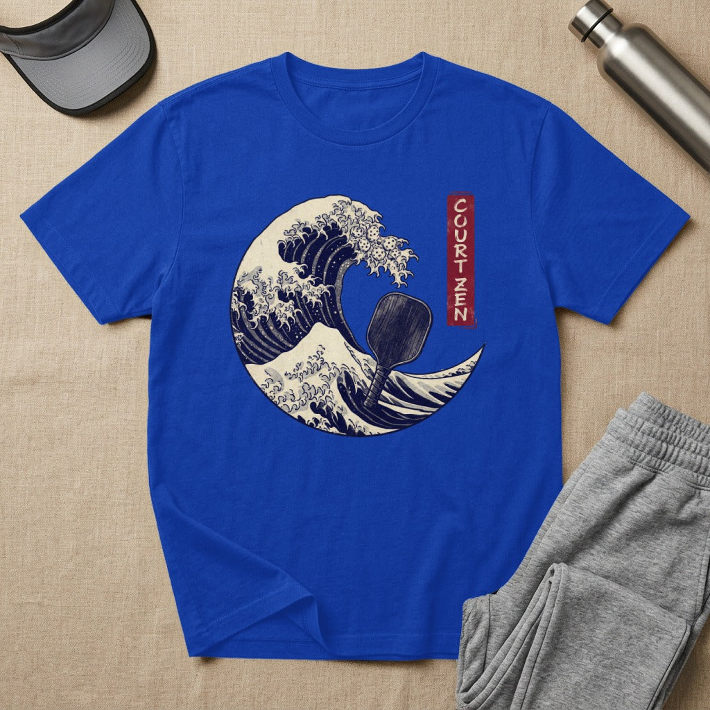 Blue t-shirt with a distressed wave design featuring a paddle and text.