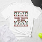 White t-shirt with "Dinkin' Through The Snow" and a Christmas-themed pickleball pattern.
