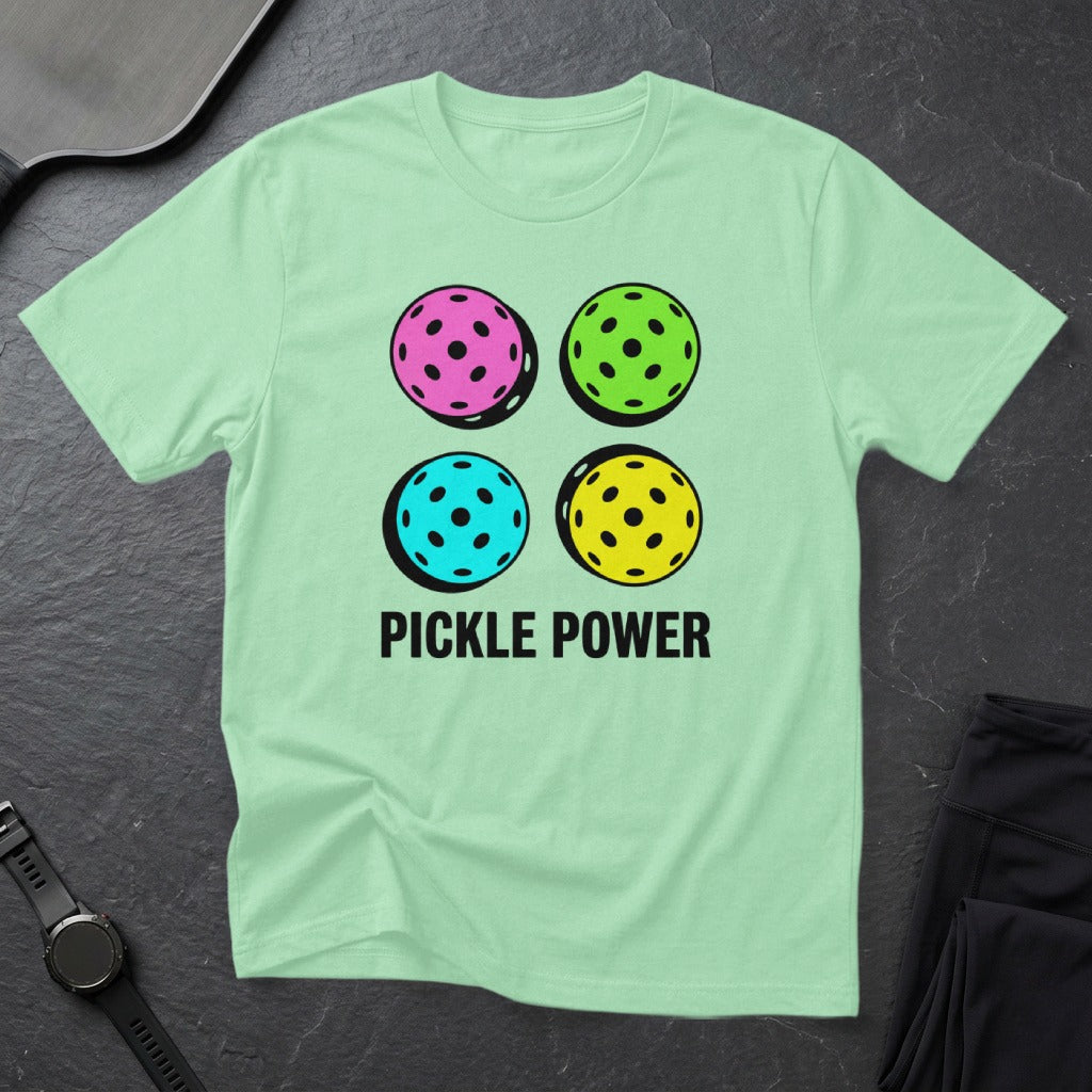 T-shirt with four colorful pickleballs and "Pickle Power" text.