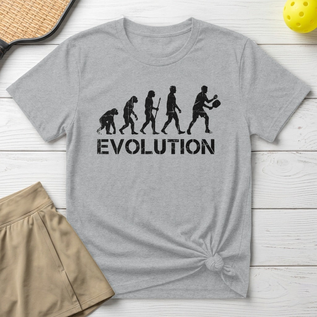 Grey t-shirt with "EVOLUTION" text and stick figures playing pickleball.