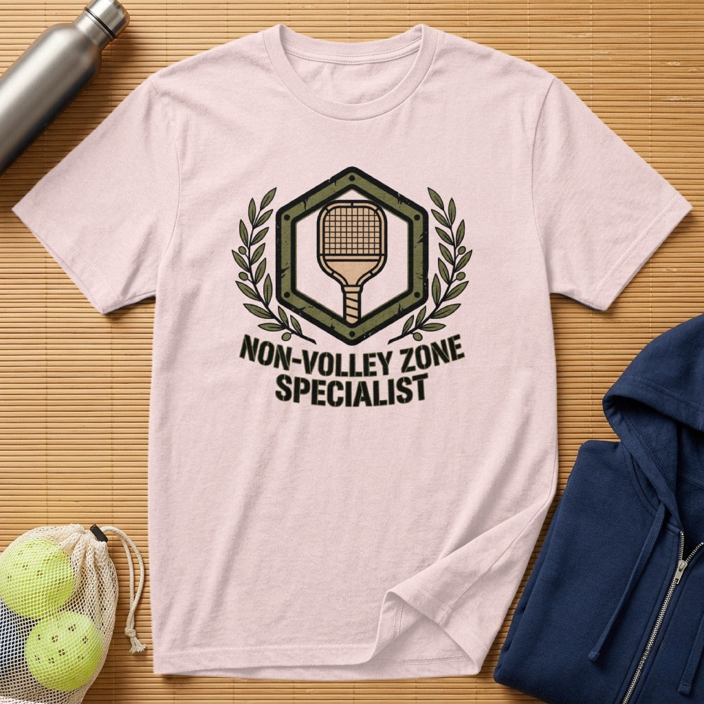Light pink t-shirt with "Non-Volley Zone Specialist" text and a pickleball paddle emblem.