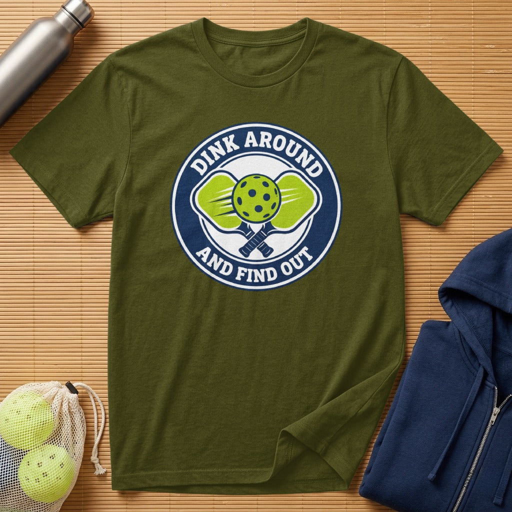 Olive t-shirt with circular pickleball graphic: "Dink Around and Find Out".