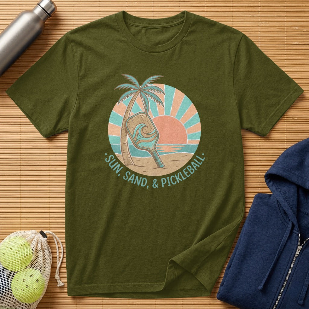 Green t-shirt with "Sun, Sand, & Pickleball" text and pickleball paddle graphic.
