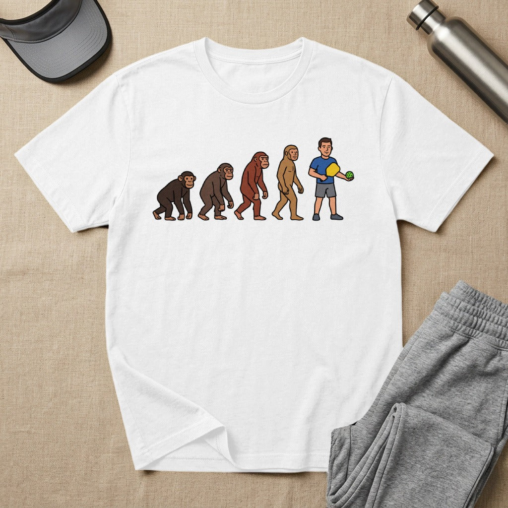 T-shirt shows human evolution ending with a man playing pickleball.