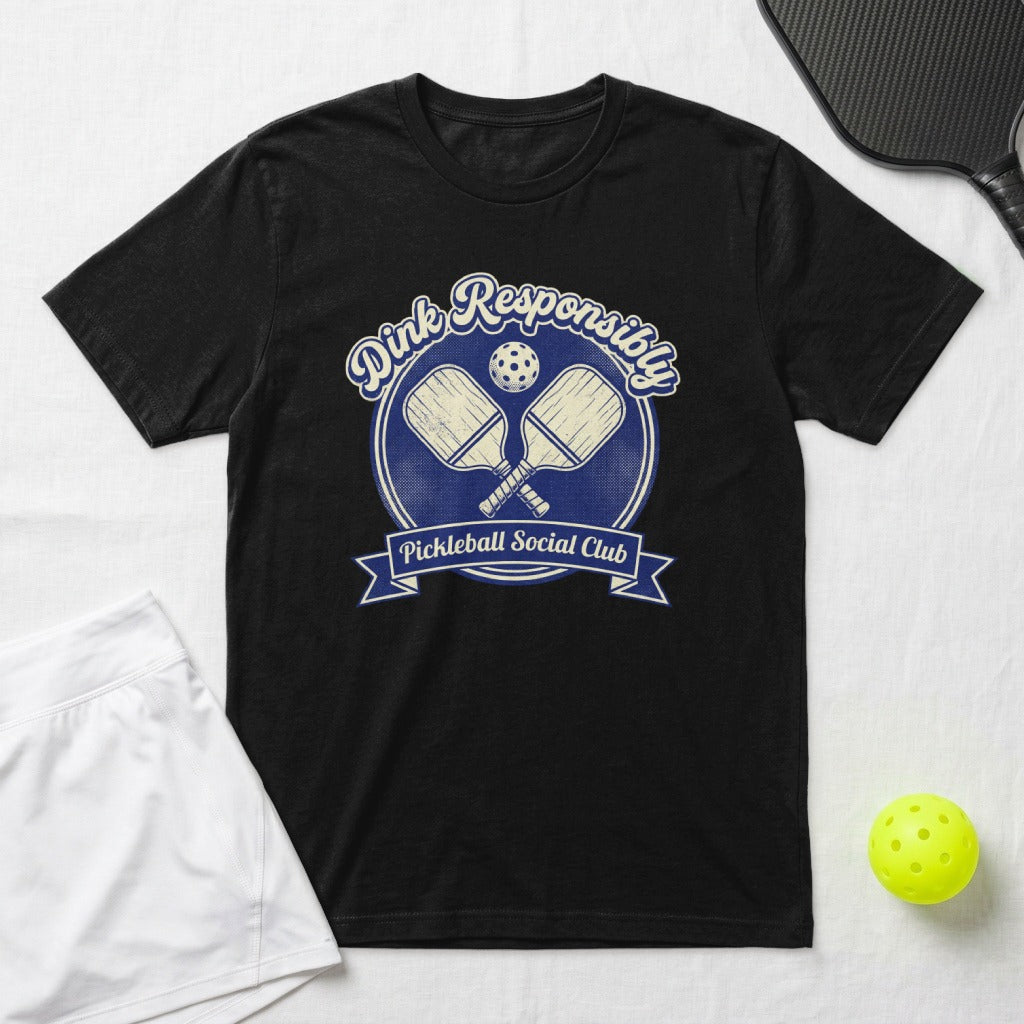 Black t-shirt with vintage pickleball paddles and "Dink Responsibly" slogan.
