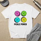 White t-shirt with four colorful pickleballs and "PICKLE POWER" text.