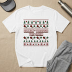 White t-shirt with "Dinkin' Through the Snow" text and festive Christmas pickleball design.