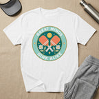 White t-shirt with "Great Minds Dink Alike" pickleball graphic.