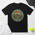 Black t-shirt with "Dink National Park Outdoor Heritage Adventure Awaits" and pickleball paddles graphic.