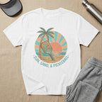 White t-shirt with "Sun, Sand, & Pickleball" text and graphic.