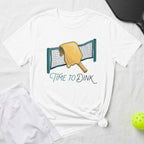 White t-shirt with "Time to Dink" graphic of pickleball paddle and net.