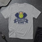 T-shirt with pickleball paddles, crown, and "Kitchen King" text.