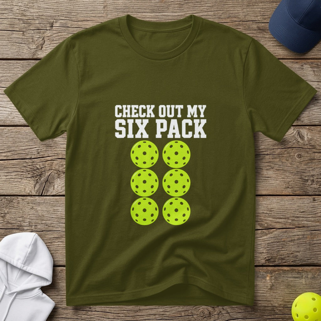 Olive t-shirt with "CHECK OUT MY SIX PACK" and six pickleballs.