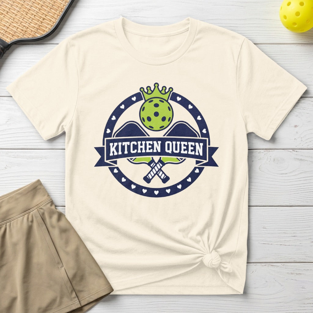 Cream t-shirt with "Kitchen Queen" text and pickleball paddles emblem.