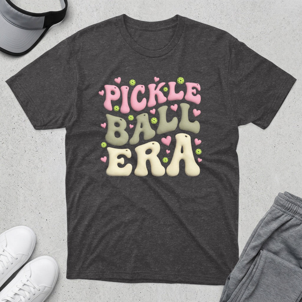Dark gray t-shirt with "Pickle Ball Era" in colorful bubble letters.