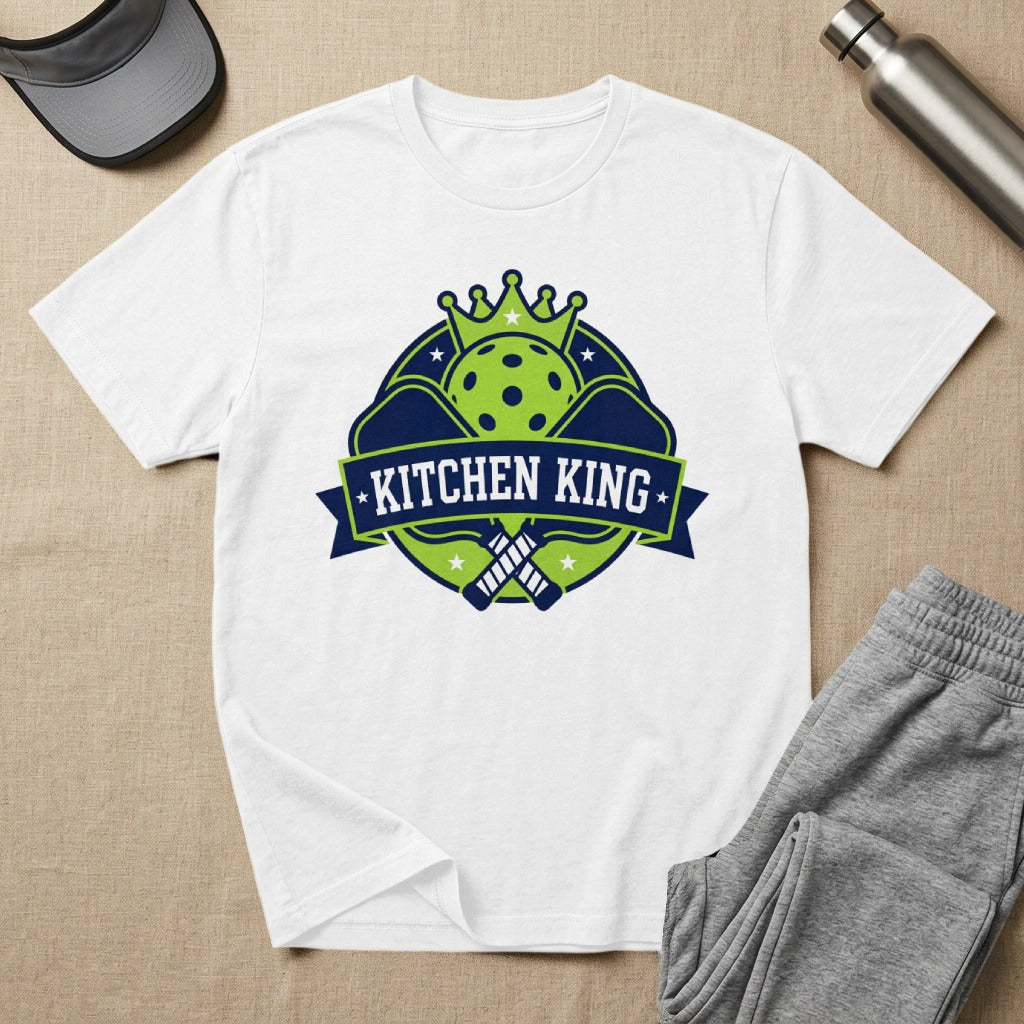 White t-shirt with "Kitchen King" logo featuring pickleball paddles and crown.