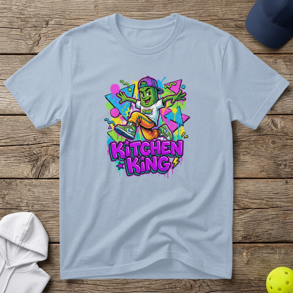 Cartoon character in a baseball cap and colorful clothes jumps on a light blue t-shirt.