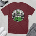 T-shirt featuring a vintage horror graphic with text: "The Dink From The Deep".