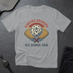 Grey t-shirt with "Dinking Grandpa Old School Cool" text and pickleball graphic.