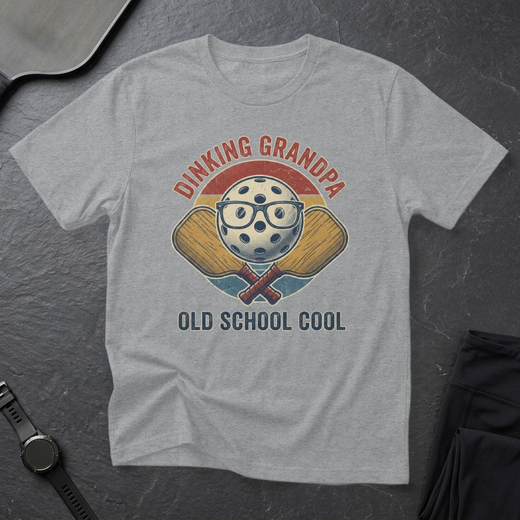 Grey t-shirt with "Dinking Grandpa Old School Cool" text and pickleball graphic.