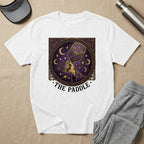 White t-shirt with celestial paddle graphic and "The Paddle" text.