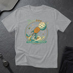 Grey t-shirt with pickleball and planet graphic.