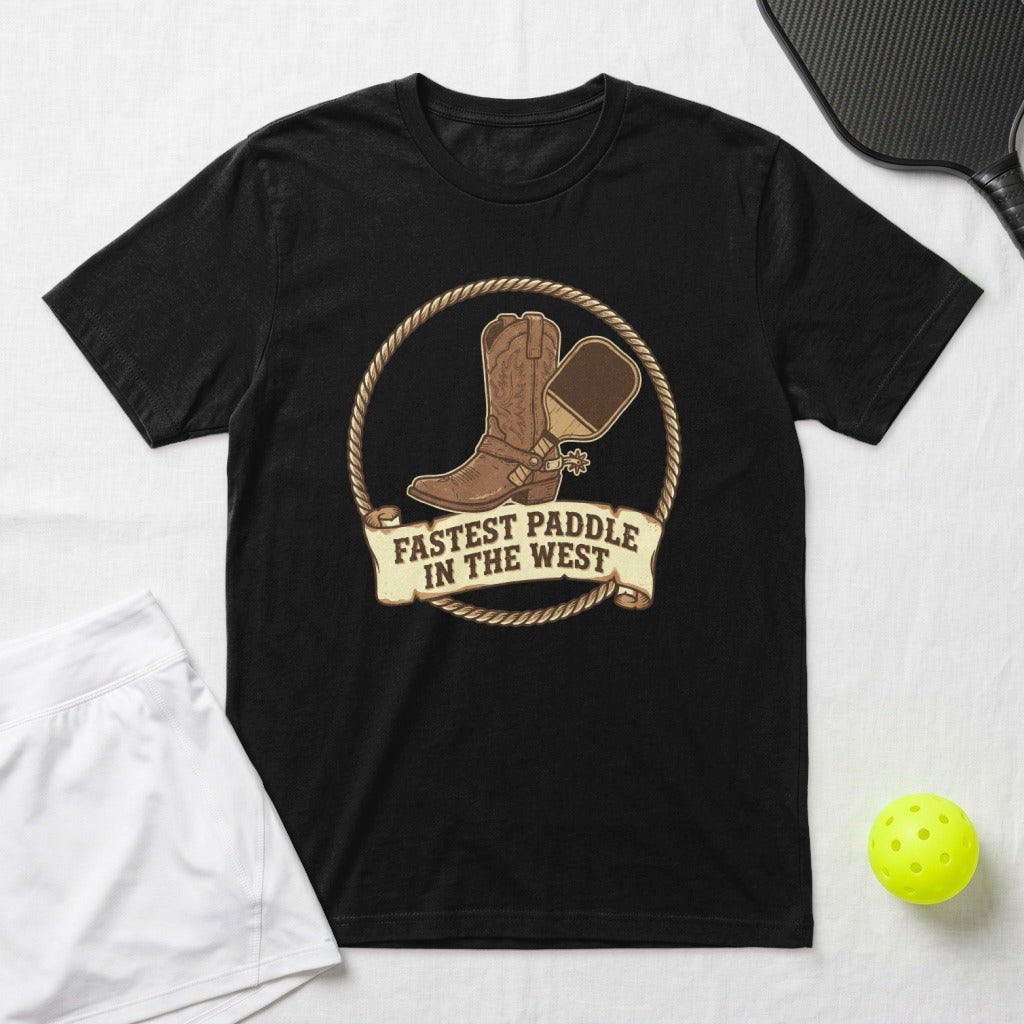 Black t-shirt with a Western-themed graphic: cowboy boot, rope, and pickleball paddle.