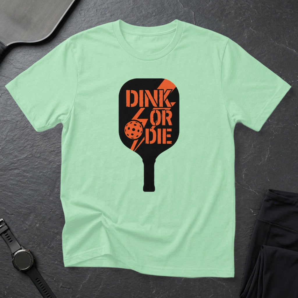 Light green t-shirt with black pickleball paddle graphic and text "DINK OR DIE".