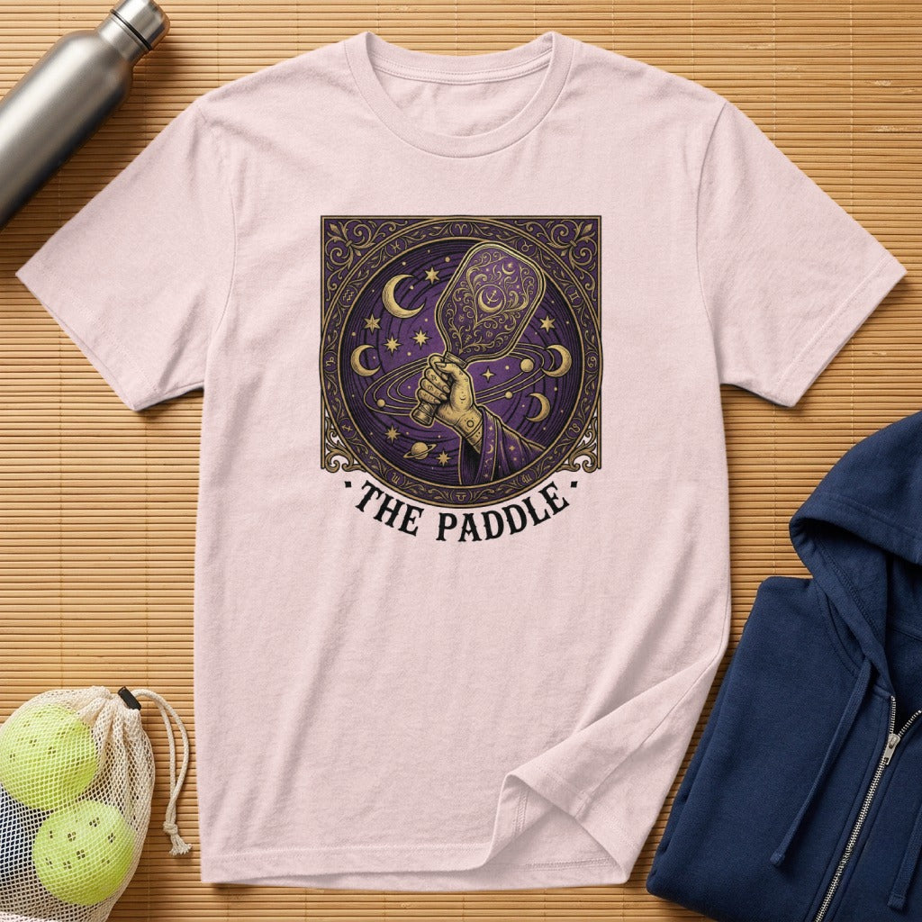 Pink t-shirt with celestial paddle graphic and text "THE PADDLE".